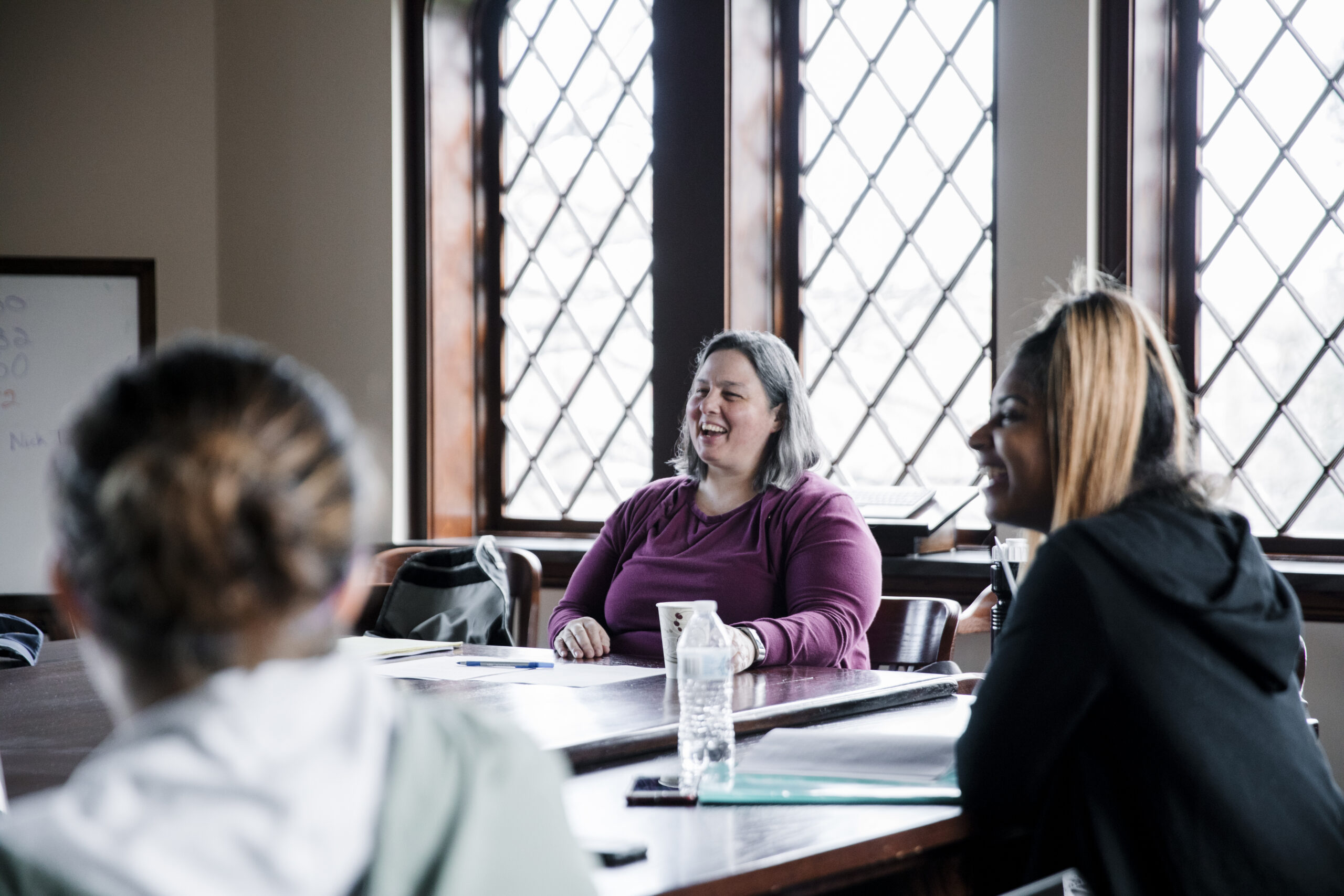 Dr. Dana Dillon Ph.D, Assistant Professor Theology teaching a round table class